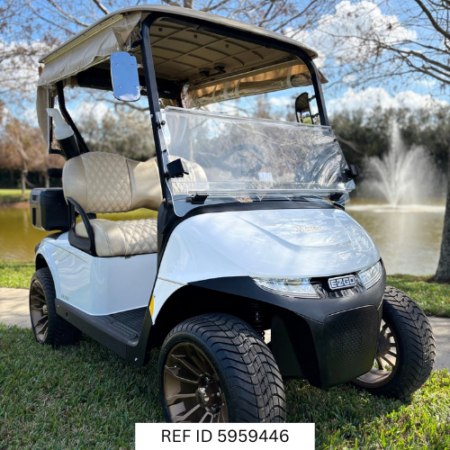 2026 E-Z-GO RXV2 Elite Bright White with custom enclosure, premium seats, and custom wheels