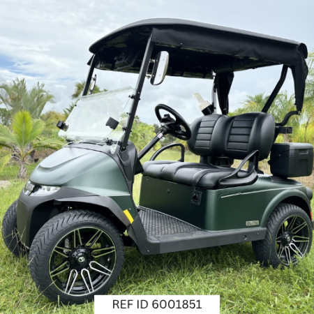 2027 E-Z-GO RXV2 Elite in matte green parked on a South Florida golf course near palm trees and fairways